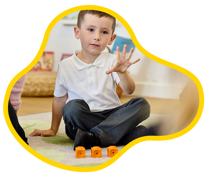 Photo of a pupil counting on fingers.