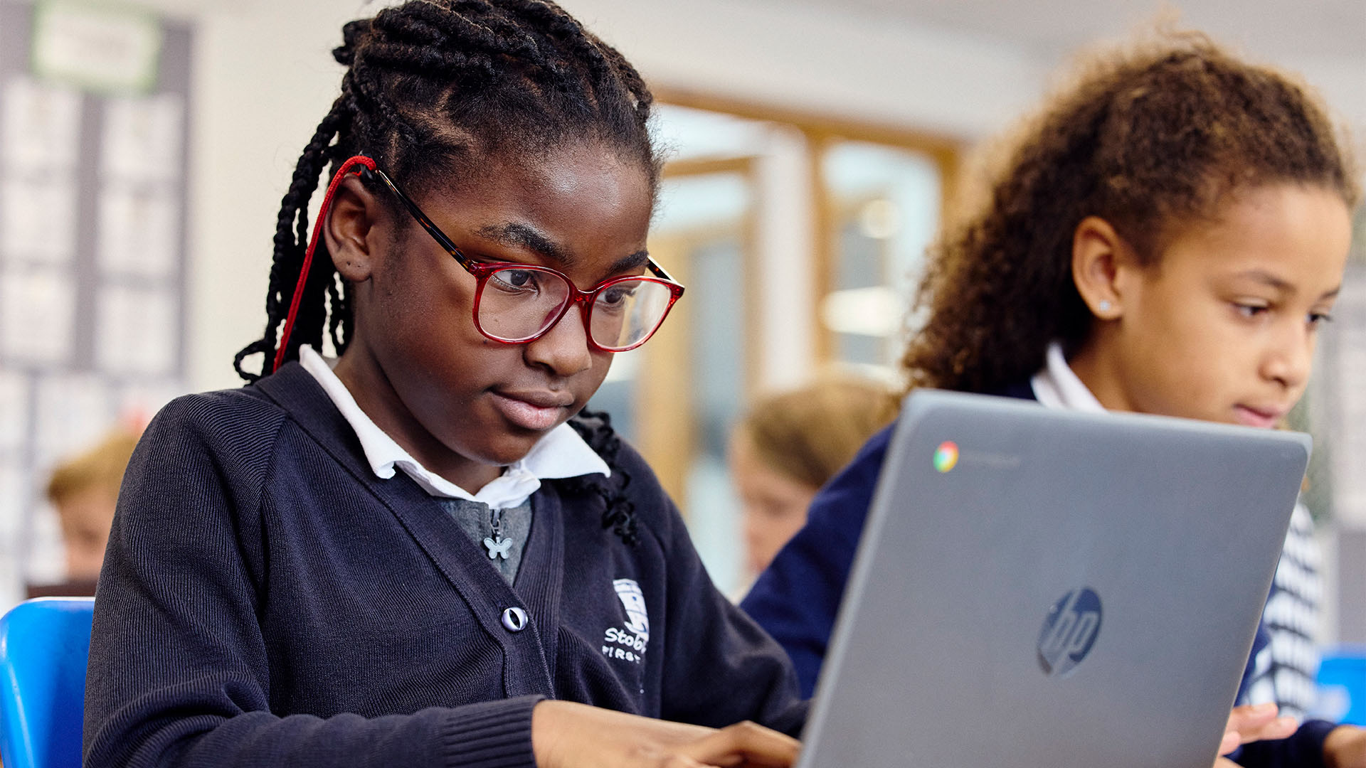 Pupils working on laptops
