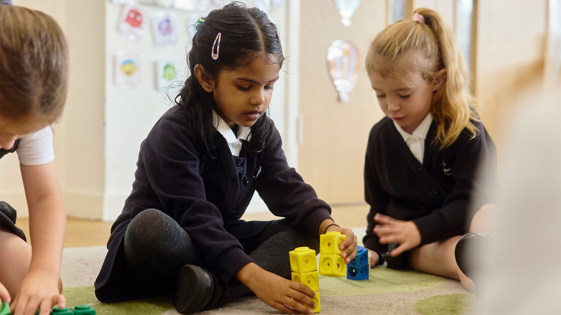 Pupils working with blocks